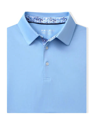 Folded Light Blue Everyday Classic Solid Polo neatly laid out for display