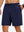 Front lower body shot of model wearing navy breathable running shorts with 4 zipper pockets