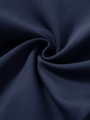 Fabric close-up showing the fleece stretch material of navy fleece stretch water resistant boys joggers.