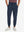 Model wearing Lightweight Ankle-Zip Sweatpants with 4 Pockets in navy, lower body front view