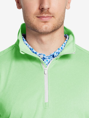 Front view from nose to chest of model wearing light green melange moisture wicking quarter zip pullover