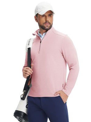 Model wearing two tone pique cotton blend q-zip in pink, hand in pocket with tennis bag