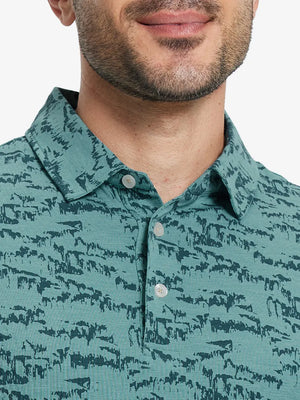Front half-body view from nose to chest of model wearing CYAN MASSIF Popular Heather Print Polo