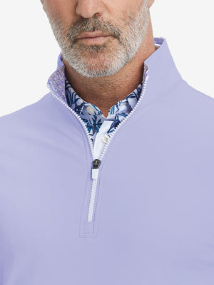 Close-up from nose to chest, showing collar and zipper detail of the lavender golf pullover.