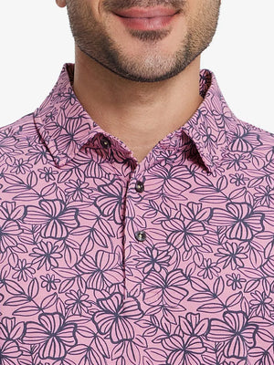 Front half-body view from nose to chest of model wearing MAUVE FLOWER Popular Heather Print Polo