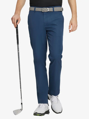 BLUE INDIGO Water Resistant Everyday Pants front view, model's lower body holding a golf club