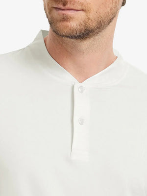 Front view from nose to chest wearing Everyday Collarless Jersey Shirt in CREAM.