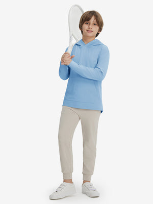Model holding tennis racquet, wearing youth long sleeve hoodied with kangaroo pocket in light blue, full-body.