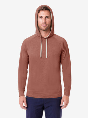 Model front upper body wearing view, heather midlayer golf hoodies in red ochre heather