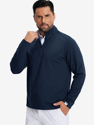 Model front upper body wearing Fleece lined golf quarter zip with sleek navy look