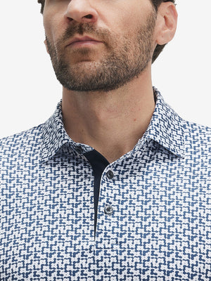 Close-up of lower face and upper shirt in Performance quick dry print golf polos, white navy clouds detail