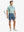 GRAYISH BLUE 4-way Stretch Performance Solid Shorts, golfer full-body front with club, 7 Inch length