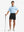 Full-body shot of model holding golf club, styled with Black Quick Dry Casual Shorts.