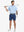 Full-body front view of model holding golf club wearing BLUE INDIGO Water Resistant Versatile 8 Pockets Shorts.
