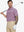 Half-body front view of model holding golf club wearing MAUVE FLOWER Popular Heather Print Polo
