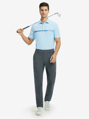 Full-body shot of model holding golf club, styled with quick dry casual dress pants in dark grey.