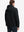 Back angle of the Polar Fleece Sweatshirt in Black, model turns head slightly for casual style.