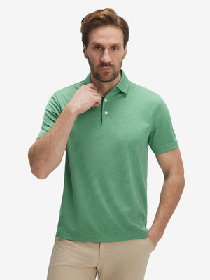 Front waist-up shot of model wearing light green ultra-light quick dry moisture wicking collared polo shirt