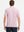 Back half-body view of model wearing LIGHT PINK STRIPE Stylish Performance Golf Polo