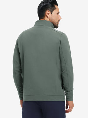 Back upper-body view of water-resistant zip up golf jacket on model, shown in slate green.