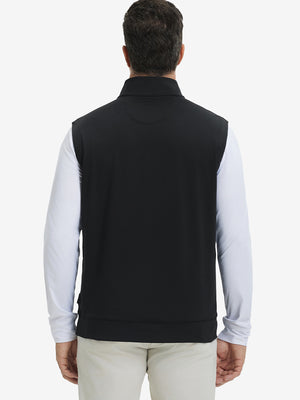 Back upper body view of the black print collar quarter zip golf vest, clean cut and relaxed posture.