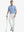 Full-body front shot with golf club, styled in Stretch Plain Everyday Pants – WHITE