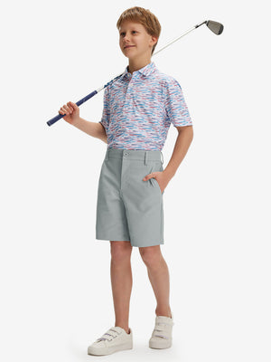 Full front: model in rose dust boys lightweight dry fit flat front golf shorts holding golf club.