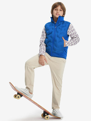 Lifestyle shots of boys full-zip fleece-lined puffer vest in klein blue
