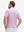 Back waist-up shot of model wearing pink white tee performance quick dry print golf polos