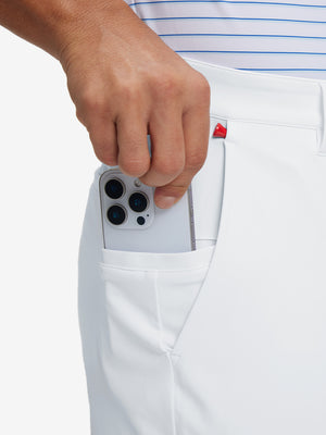 Waistband detail of soft lightweight casual golf pants with 5 pockets in white, neat stitching.
