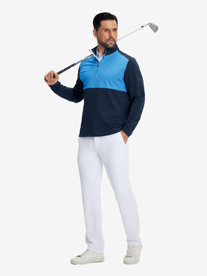 Model holding golf club wearing Fleece lined golf quarter zip in active navy/blue