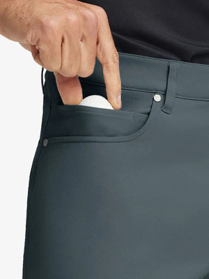 DARK GREY 4-way Stretch Performance Solid Shorts, front pocket holding golf ball detail, 7 Inch