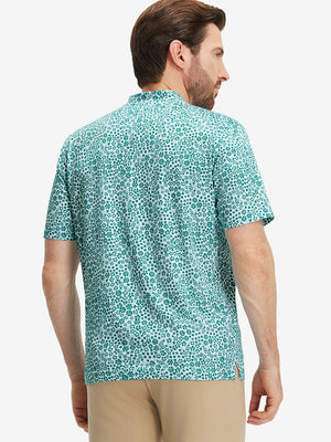 Back half-body of model in white green florals stretch printed collarless henley golf shirts