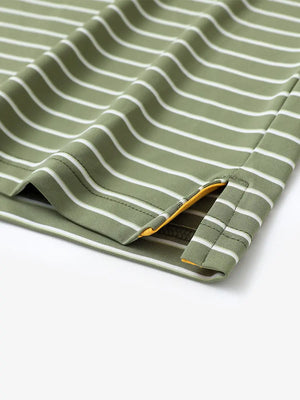 Hem slit detail of LIGHT GREEN/WHITE STRIPE Youth Performance Golf Polo highlighting stitching and finish.