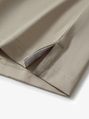 Close-up of side slit hem detail on DARK KHAKI Long Sleeve Solid Jersey Polo