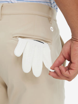 Back pocket detail of Golf Lightweight Fleece Lined Dress Pants in light khaki