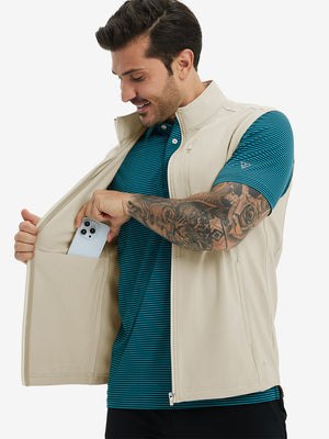 Close-up of water-resistant fleece golf vests pocket holding a phone, practical detail in light khaki