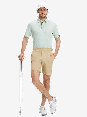 Full-body shot of a model holding a golf club, wearing the emerald feather weight jacquard polo shirts and pants