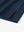 Hem slit detail of NAVY Stylish Chest Print Snap Polo highlighting stitching and finish