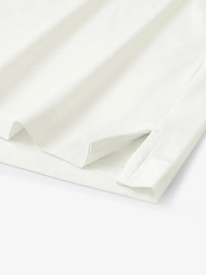 Hem slit detail of Everyday Collarless Jersey Shirt in CREAM.