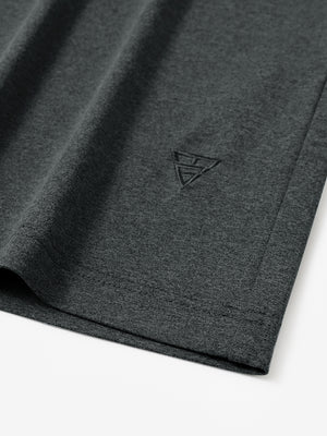 Hem detail of Men’s Long Sleeve Mock Turtleneck Shirt in Dark Grey Heather, showcasing smooth finish.
