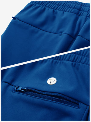 Close-up of the zipper detail of klein blue fleece stretch water resistant boys joggers.