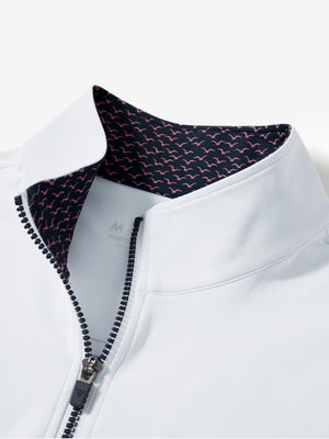 Zipper and inner pattern detail of the print collar quarter zip golf vest in white, highlighting design.