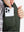 Close-up of boys full-zip fleece-lined puffer vest pocket holding a phone, practical detail in army green
