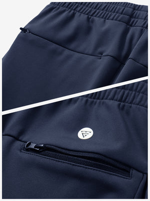 Close-up of the zipper detail of navy fleece stretch water resistant boys joggers.