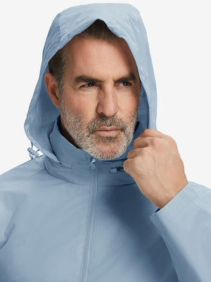 Close-up of hood on the lightweight water-repellent softshell hooded jacket, worn by model in slate blue.
