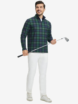 Full body model holding a golf club, wearing full print lightweight quarter zip pullover in dark plaid