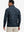 Back upper body angle of the ocean yacht full print quarter zip pullover, model turns head slightly.