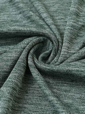 Close-up of turquoise heather modern fit melange polo fabric showing soft and textured surface.