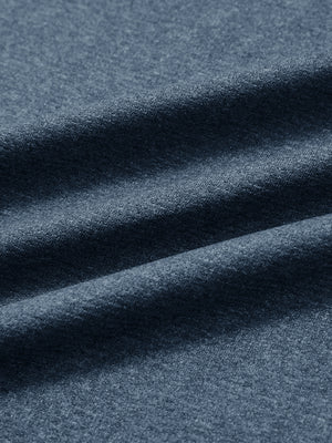 Close-up of classic heather pullover hoodies with 2 pocket fabric in navy melange, soft knit texture